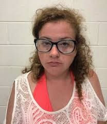 Two arrested after woman's body found in Carroll County