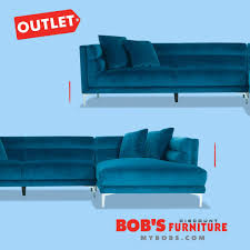 The futon is a classic hardwood frame with mission style arms. Bobs Furniture Futons