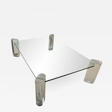 Coffee table covered in red leather with inset smoked glass top designed by karl springer signed and dated 1983. Karl Springer Lucite And Glass Cocktail Table In The Manner Of Karl Springer