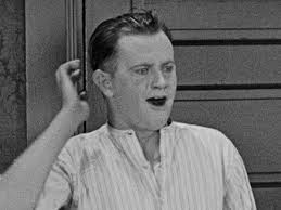 Human Fly" Harry Gardiner hanging from the 24th floor of the Hotel McAlpin 