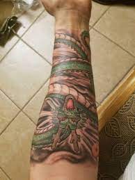 Tattoo on r_arm (rfa and upr arm indian faces/female faces); Shenron Tattoo Shenrontattoo Shenron Dragonballtattoo Dbztattoos Dragon Ball Tattoo Shenron Tattoo Sheng Long Tattoo