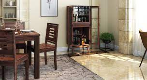 Whether you prefer a metal, glass or wood dining room table you'll find it in a square, round or rectangular shape that perfectly fits your dining space. Bar Furniture Urban Ladder