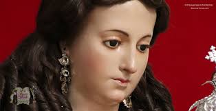 La Virgen del Rosario cerca de sus devotos