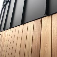 Green Designer Homes On Instagram Where The Timber Meets The Matt Black Colorbond Can T Go Wrong With This House Cladding Facade House Modern House Exterior
