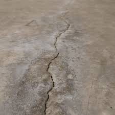 A floor that sags towards the center of the house; Foundation Heave Foundation Recovery Systems