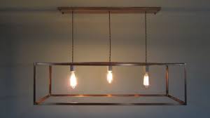 Though expensive (relatively) you can purchase a fan box kit that includes a rated box and an apparatus that allows you to use the two apposing. Industrial Lighting Copper Cage Chandelier Bare Bulb By Khalima 495 00 Cage Chandelier Dining Light Fixtures Dining Room Light Fixtures