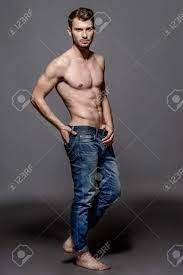 Full Length Portrait Of A Young Man In Jeans And Shirtless Posing At Studio Gray Background Men S Health Beauty Jeans Fashion Stock Photo Picture And Royalty Free Image Image 92419299