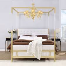 Keane streamlines the traditional canopy bed into an open, airy cube of beautiful mahogany veneer and solid mahogany. Raegan Queen Canopy Bed Gold By Acme Furniture Furniturepick