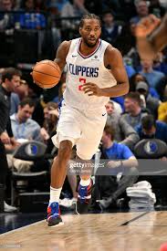 Kawhi Leonard Of The La Clippers Handles The Ball Against The Dallas La Clippers Los Angeles Clippers Nba Players