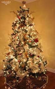 My Christmas Tree For 2013 I Used The Ribbon Vertically Instead Of H Ribbon On Christmas Tree Christmas Tree Decorations Ribbon Christmas Tree Decorations Diy