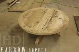 This coffee table handcrafted from reclaimed wood is a wonderful combination of tradition and modernity, which will suit both a rural cottage and an urban loft. Reclaimed Wood Round Coffee Tables Epoxy Hemlock Gerald Reinink 11 Blog