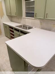 Replace your old kitchen countertops with quartz, granite, solid surface, laminate and more. Diy Kitchen Countertop Installing New Laminate Over Old Laminate Addicted 2 Decorating