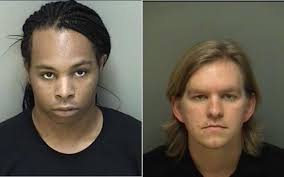 Two men charged with soliciting a minor