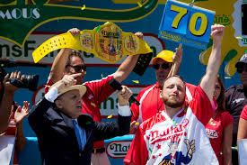 Eating popcorn in less than 5 hours. Joey Chestnut Beats His Own Record As He Takes Back The Nathan S Hot Dog Eating Championship