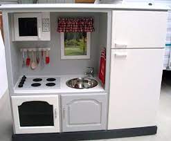 Convert Old Tv Cabinets Into State Of The Art Play Kitchens Curbly Diy Desi Kids Play Kitchen Diy Play Kitchen Play Kitchen