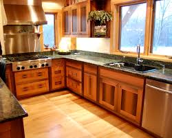 Salvage stores are a good place to find reclaimed wood and architectural details for your recycled kitchen cabinets. Kitchen Cabinetry Newwoodworks