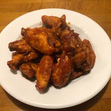 Air fryer chicken wings are so crispy and delicious without using any extra oil! Taco Sauce Crushed Chilies And Tabasco On Air Fryer Wings From Frozen Costco Wings