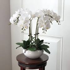 The flowers are great as a dining room centerpiece but you are free to use them in any purple artificial flowers in the glass vase. 1 Set Orchids Real Touch Flower With Leaves Artificial Orchids Arrangement Diy Arrange Flower No Vase Kunstliche Orchideen Orchideen Blumenarrangements