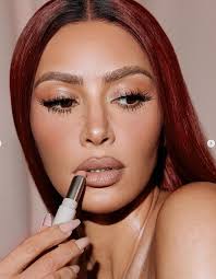 Kim Kardashian, 44, is nearly unrecognizable with red hair and  micro-freckles for announcement