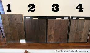 The wooden floor in the kitchen is not as bad as the choice in the bathroom. Dark Brown Hardwood Flooring One Hundred Dollars A Month