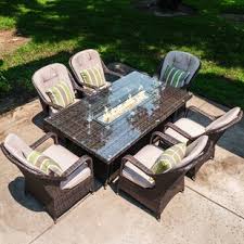 Aluminum is a durable table material. 50 Round Outdoor Dining Table With Fire Pit Quality Teak