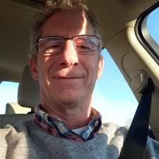 What could be the cause of a boat engine shutting off instantly and getting  stuck in gear after hitting plastic debris in the water?