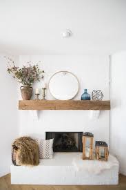 I love the coastal farmhouse look and i think this tile fit that vibe perfectly! Tulsa Remodel Reveal Modern White Farmhouse White Brick Fireplace Wood Beam Mantle Gold Round Mirror 1 2 Cc Mike