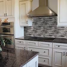 A mini yet mighty rental kitchen makeover this little kitchen got a major makeover thanks to carrara marble peel and stick tiles from home depot. Backsplash Ideas Home Depot Nbizococho