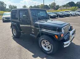 Image result for Brilliant Black 2003 Jeep