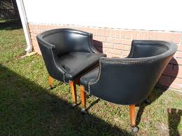 Pair Of 70s Vintage Mid Century Black Faux Leather Barrel Club Chairs On Casters Club Chairs Chair Black Faux Leather