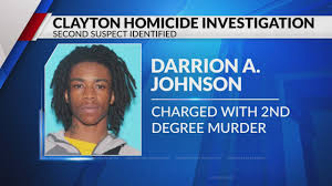 2nd suspect in Clayton murder charged, remains at large