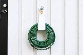 Bend the hose to make an approximate 3 metres diameter coil. Best Garden Hose Hanger Options For An Organized Garden