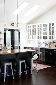 one color fits most: black kitchen cabinets