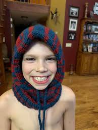 Dakota watching TV with my youngest Granddaughter.