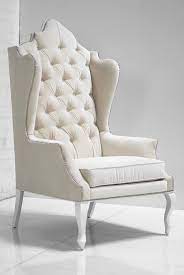 One chair has an area of slight discoloration (almost a slightly darker off white; Pin By 555499289642 On Home Design White Chair Velvet Wingback Chair Upholstered Chairs