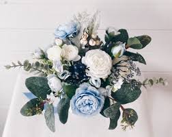 Bring your wedding to the next level with tulle dresses, shantung fabrics and wild flowers for a day that's uniquely yours. Dusty Blue Bouquet Etsy