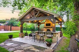 This Freestanding Covered Patio With An Outdoor Kitchen And Fireplace Is The Perfect Retreat From The Constraint Backyard Gazebo Backyard Outdoor Patio Designs