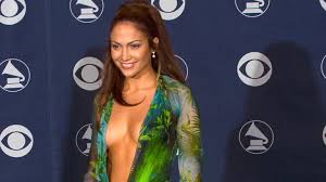 Jennifer lopez is truly the definition of a triple threat. The Story Of Jennifer Lopez S Iconic Green Jungle Versace Dress Biography