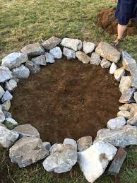 In Only Two Hours Time Digging And Placing We Now Have A Fire Pit Natural Fire Pit Fire Pit Backyard Outside Fire Pits