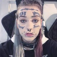 Image result for quirky pylon forehead tattoo