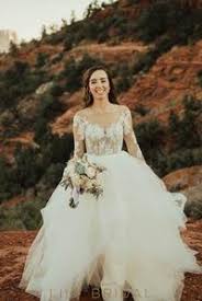 This elongating sleeve style dresses up plain gowns and grounds embellished ones for a look that makes a beautiful impact. Champagne Long Sleeve Vintage Lace Wedding Dress Fashion Dresses