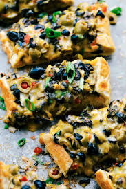 Cheesy Olive Bread Is A Crunchy Bread Layered With Salty Green Olives Black Olives Chunks Of Tomatoes And Melt Olive Bread Homemade Garlic Bread Cheesy Bread
