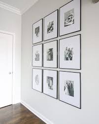 Black And White Family Photo Gallery Wall Cool Elegance Loving These Black And White Family Photos Framed In Wide Mats And Thin Black Frames S Hallway Gallery Wall Gallery Wall Decor Frames On Wall