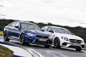 M models m5 sedan package includes. Sportlimousinen Der Neue M5 Trifft Auf Den Amg E 63 S Autobild De