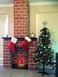 Bring in the christmas an holiday spirits with your fireplace!! Fireplace And Chimney For Santa Made With Cardboard Boxes And Paper Diy Christmas Fireplace Christmas Decor Diy Christmas Diy