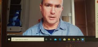 Spot the ghostly figure in the background while Scott Lawley, Culture and  Organizarion Editor contributes to Quarantine SCOS.