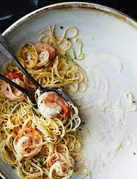 Angel Hair Pasta With Shrimp And Green Garlic A Blend Of Fresh Green Garlic Mixed With Light Cream Makes This A Perfect Wint Food Recipes Green Garlic Recipes