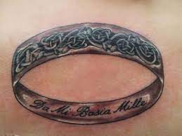 8 Tattoos For Truly Dedicated Outlander Fans In 2020 Tattoo Wedding Rings Outlander Tattoos Ring Tattoos