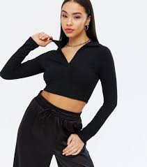 Part of a matching set. Black Ribbed V Collared Long Sleeve Crop Top New Look