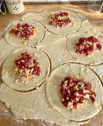 Pasties made in Plymouth, so just over the border 🙂, by 11 year old and me  just supervising. Proper 'ansum, loads of seasoning and decent amount of  skirt. Half and half for